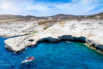 swimming spots in Milos by boat